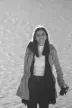 woman in black jacket smiling